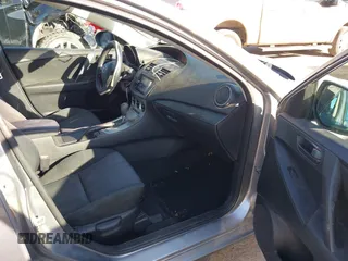 2010 Mazda 3 i SV with VIN JM1BL1SF6A1142565, listed as a IAAI auction lot 40677322 with 143,324 mi miles and . Bid and sale history available at DreamBid. Image 5.