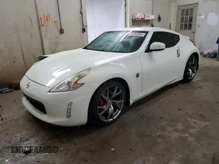 2013 Nissan 370Z Touring z VIN JN1AZ4EH5DM383466, wystawiony jako Copart lot #85704054 z przebiegiem 37 892 mil mil oraz Szkoda całkowita • Salvage title. Historia ofert i sprzedaży dostępna na DreamBid. Obrazek 1.