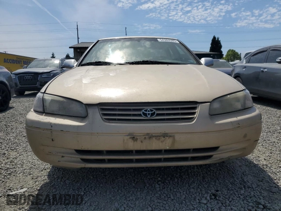 1999 Toyota Camry LE с VIN JT2BG22K6X0369818, выставлен на аукционе Copart как лот 54369385 с пробегом 246 320 миль миль и Списание • Salvage title. История ставок и продаж доступна на DreamBid. Изображение 5.