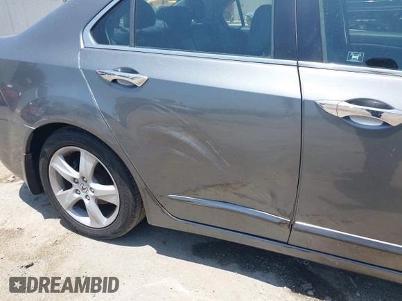 2010 Acura TSX z VIN JH4CU2F64AC033946, wystawiony jako IAAI lot #42544399 z przebiegiem 120 477 mil mil oraz . Historia ofert i sprzedaży dostępna na DreamBid. Obrazek 12.