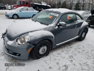 2014 Volkswagen Beetle 2.5L w/Sun with VIN 3VWJP7AT0EM608328, listed as a Copart auction lot 86209494 with 118,767 mi miles and Clean Title. Bid and sale history available at DreamBid. Image 1.