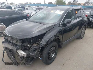 2019 Honda CR-V EX with VIN 5J6RW1H50KA009753, listed as a IAAI auction lot 41920084 with 59,129 mi miles. Bid and sale history available at carsss.com. Image 2.