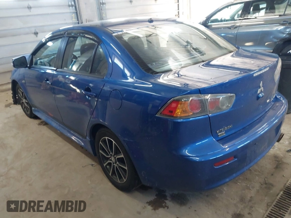 2017 Mitsubishi Lancer ES with VIN JA32V2FW4HU006890, listed as a IAAI auction lot 41636035 with 165,077 mi miles. Bid and sale history available at carsss.com. Image 3.