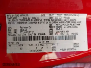2015 Ford Focus ST with VIN 1FADP3L98FL207998, listed as a IAAI auction lot 41880849 with 203,571 mi miles. Bid and sale history available at carsss.com. Image 9.