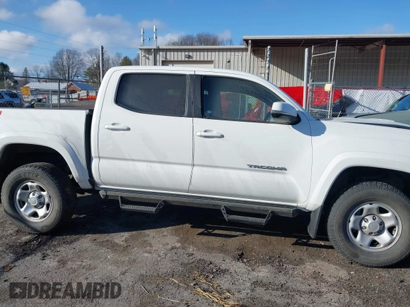 2023 Toyota Tacoma 4WD SR with VIN 3TMCZ5AN1PM538367, listed as a IAAI auction lot 41468684 with 28,879 mi miles. Bid and sale history available at carsss.com. Image 13.