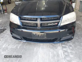2014 Dodge Avenger SE with VIN 1C3CDZAB0EN202602, listed as a IAAI auction lot 42133657 with 130,741 mi miles. Bid and sale history available at carsss.com. Image 6.