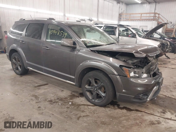 2018 Dodge Journey Crossroad with VIN 3C4PDDGG4JT388786, listed as a IAAI auction lot 40948539 with 122,449 mi miles. Bid and sale history available at carsss.com. Image 1.