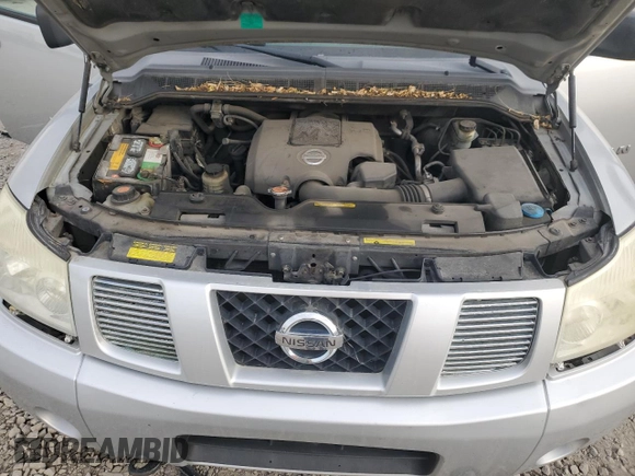 2007 Nissan Titan XE z VIN 1N6AA07B67N204661, wystawiony jako Copart lot #52316275 z przebiegiem 168 269 mil mil oraz Szkoda całkowita • Salvage title. Historia ofert i sprzedaży dostępna na DreamBid. Obrazek 12.