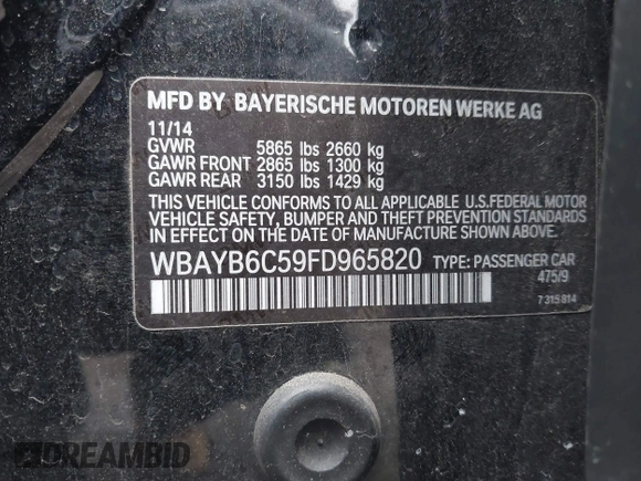 2015 BMW 7 Series 750i xDrive with VIN WBAYB6C59FD965820, listed as a IAAI auction lot 41558215 with 142,617 mi miles. Bid and sale history available at carsss.com. Image 9.