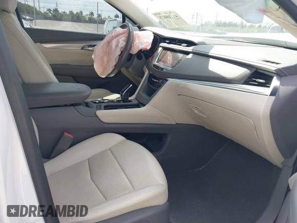 2020 Cadillac XT5 Premium Luxury FWD with VIN 1GYKNCRS7LZ129119, listed as a IAAI auction lot 41710878 with 52,575 mi miles and . Bid and sale history available at carsss.com. Image 5.