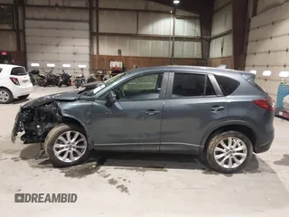 2013 Mazda CX-5 Grand Touring with VIN JM3KE2DE3D0128449, listed as a IAAI auction lot 41161558 with 108,618 mi miles. Bid and sale history available at carsss.com. Image 14.