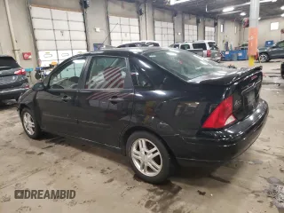 2000 Ford Focus with VIN 1FAHP3430YW406024, listed as a Copart auction lot 86580314 with 99,158 mi miles and Clean title. Bid and sale history available at DreamBid. Image 2.