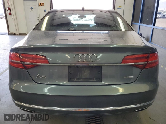 2015 Audi A8 with VIN WAUJGAFD3FN016587, listed as a Copart auction lot 60778904 with 116,818 mi miles and Clean title. Bid and sale history available at DreamBid. Image 6.