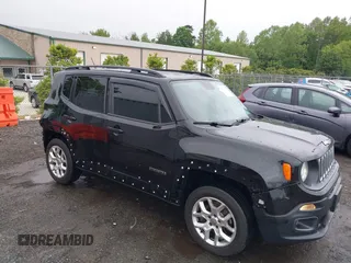 2015 Jeep Renegade Latitude z VIN ZACCJBBT8FPB25943, wystawiony jako IAAI lot #42120185 z przebiegiem 103 956 mil mil oraz . Historia ofert i sprzedaży dostępna na DreamBid. Obrazek 1.