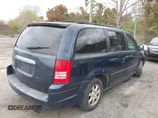 2008 Chrysler Town & Country LX with VIN 2A8HR44H28R114978, listed as a IAAI auction lot 41860775 with 179,828 mi miles. Bid and sale history available at carsss.com. Image 4.