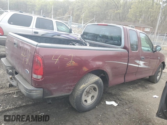 1998 Ford F-150 with VIN 1FTZX1727WNB55284, listed as a Copart auction lot 51781465 with 258,600 mi miles and Salvage title. Bid and sale history available at DreamBid. Image 3.