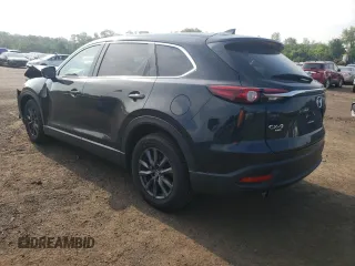 2022 Mazda CX-9 Sport с VIN JM3TCBBY2N0607874, выставлен на аукционе Copart как лот 59440115 с пробегом 35 771 миль миль и Списание • Salvage title. История ставок и продаж доступна на DreamBid. Изображение 2.
