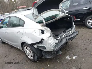2017 Kia Forte LX with VIN 3KPFK4A71HE090673, listed as a IAAI auction lot 41504905 with 148,388 mi miles. Bid and sale history available at carsss.com. Image 3.