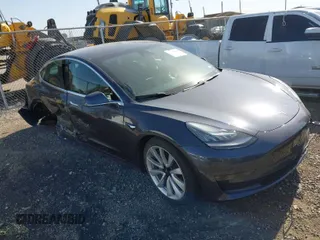 2020 Tesla Model 3 Long Range with VIN 5YJ3E1EB6LF666624, listed as a IAAI auction lot 41720664 with 65,973 mi miles. Bid and sale history available at carsss.com. Image 1.