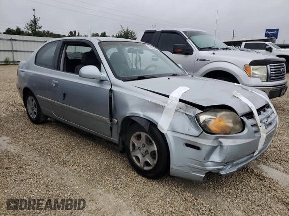2005 Hyundai Accent GLS with VIN KMHCG35C75U354574, listed as a Copart auction lot 74931444 with 141,013 mi miles and Salvage Title. Bid and sale history available at carsss.com. Image 4.