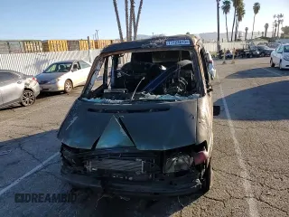 2001 Volkswagen EuroVan MV с VIN WV2NB47061H099148, выставлен на аукционе Copart как лот 77123813 с пробегом Не указан миль и На запчасти • Non repairable. История ставок и продаж доступна на DreamBid. Изображение 11.