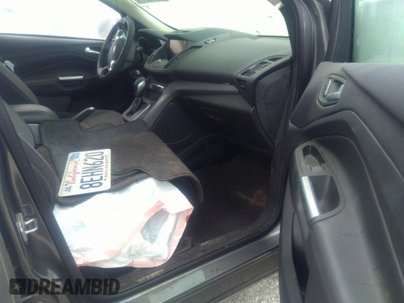 2014 Ford Escape SE with VIN 1FMCU0GXXEUA77765, listed as a IAAI auction lot 40158558 with 88,373 mi miles. Bid and sale history available at carsss.com. Image 5.