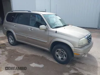 2002 Suzuki XL-7 Standard with VIN JS3TX92V224127965, listed as a IAAI auction lot 42056299 with 176,502 mi miles. Bid and sale history available at carsss.com. Image 1.