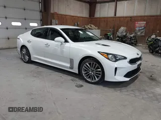 2018 Kia Stinger with VIN KNAE15LA6J6031821, listed as a IAAI auction lot 41871185 with 164,393 mi miles. Bid and sale history available at carsss.com. Image 1.