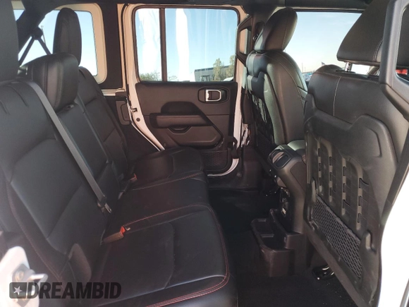 2023 Jeep Wrangler Rubicon Farout с VIN 1C4JJXFM2PW588219, выставлен на аукционе Copart как лот 77599774 с пробегом 38 914 миль миль и Списание • Salvage title. История ставок и продаж доступна на DreamBid. Изображение 12.