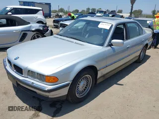 2000 BMW 7 Series 740iL with VIN WBAGH8341YDP14211, listed as a IAAI auction lot 42671152 with 247,472 mi miles and . Bid and sale history available at DreamBid. Image 2.