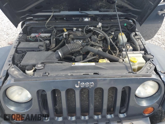 2008 Jeep Wrangler X z VIN 1J4FA24178L619687, wystawiony jako Copart lot #62535985 z przebiegiem 137 710 mil mil oraz Szkoda całkowita • Salvage title. Historia ofert i sprzedaży dostępna na DreamBid. Obrazek 12.