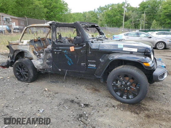 2023 Jeep Wrangler Sahara z VIN 1C4JJXP66PW698724, wystawiony jako Copart lot #55587825 z przebiegiem Nie podano mil oraz Nie do naprawy • Non repairable. Historia ofert i sprzedaży dostępna na DreamBid. Obrazek 4.