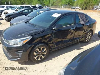 2022 Kia Rio LX z VIN 3KPA24AD9NE458402, wystawiony jako IAAI lot #42046422 z przebiegiem 30 137 mil mil oraz . Historia ofert i sprzedaży dostępna na DreamBid. Obrazek 2.