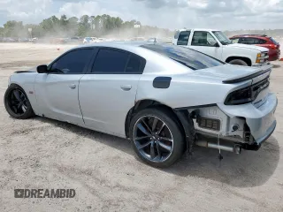 2019 Dodge Charger Scat Pack z VIN 2C3CDXGJ9KH742490, wystawiony jako Copart lot #53571945 z przebiegiem 18 861 mil mil oraz Szkoda całkowita • Salvage title. Historia ofert i sprzedaży dostępna na DreamBid. Obrazek 2.