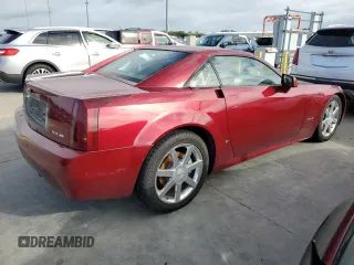 2007 Cadillac XLR z VIN 1G6YV36A575601135, wystawiony jako Copart lot #75123444 z przebiegiem Nie podano mil oraz Szkody całkowita. Historia ofert i sprzedaży dostępna na DreamBid. Obrazek 3.