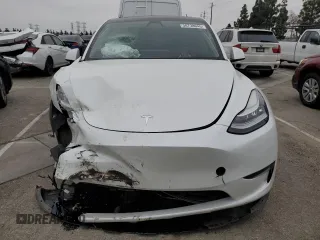 2021 Tesla Model Y Long Range with VIN 5YJYGDEE3MF214823, listed as a Copart auction lot 50738045 with 63,227 mi miles and Salvage Title. Bid and sale history available at DreamBid. Image 5.