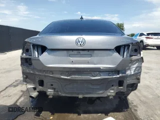 2015 Volkswagen Passat SEL Premium with VIN 1VWCV7A36FC007670, listed as a Copart auction lot 60208065 with 143,703 mi miles and Salvage title. Bid and sale history available at DreamBid. Image 6.