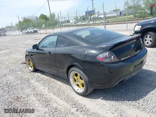 2007 Hyundai Tiburon GS with VIN KMHHM66D87U255336, listed as a IAAI auction lot 42035856 with 177,338 mi miles. Bid and sale history available at carsss.com. Image 3.