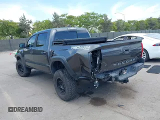 2019 Toyota Tacoma SR with VIN 3TMCZ5AN3KM207783, listed as a IAAI auction lot 42375280 with 55,784 mi miles and . Bid and sale history available at DreamBid. Image 3.