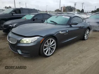2014 BMW Z4 sDrive35i with VIN WBALM7C50EE385780, listed as a Copart auction lot 82884414 with 88,765 mi miles and Salvage Title. Bid and sale history available at carsss.com. Image 1.