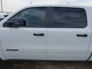 2023 Ram 1500 Limited with VIN 1C6SRFHT5PN576378, listed as a IAAI auction lot 42253096 with 41,802 mi miles and . Bid and sale history available at DreamBid. Image 13.