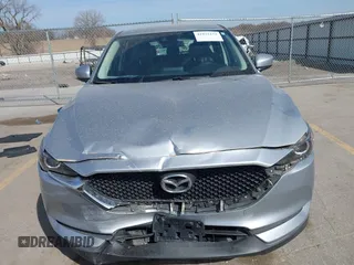 2019 Mazda CX-5 Sport with VIN JM3KFBBM6K1582760, listed as a IAAI auction lot 41822152 with 60,620 mi miles and . Bid and sale history available at DreamBid. Image 12.