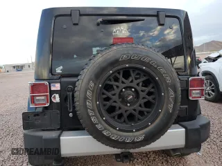 2014 Jeep Wrangler Unlimited Sahara with VIN 1C4BJWEG1EL109197, listed as a Copart auction lot 41699645 with 168,391 mi miles and Salvage Title. Bid and sale history available at carsss.com. Image 6.