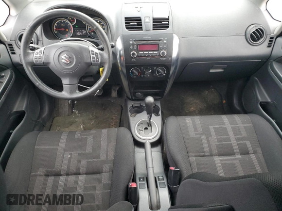 2012 Suzuki SX4 Crossover with VIN JS2YB5A30C6306884, listed as a Copart auction lot 86396074 with 91,557 mi miles and Salvage Title. Bid and sale history available at carsss.com. Image 8.