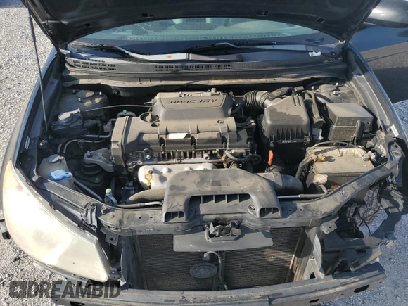 2009 Hyundai Elantra SE z VIN KMHDU46D39U608524, wystawiony jako Copart lot #57435405 z przebiegiem 216 619 mil mil oraz Szkoda całkowita • Salvage title. Historia ofert i sprzedaży dostępna na DreamBid. Obrazek 11.