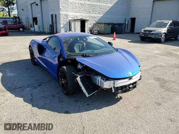 2023 McLaren Artura z VIN SBM16AEA9PW001592, wystawiony jako Copart lot #50613595 z przebiegiem 2956 mil mil oraz Szkody całkowita. Historia ofert i sprzedaży dostępna na DreamBid. Obrazek 12.