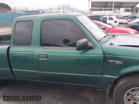 1999 Ford Ranger XLT with VIN 1FTYR14X2XPB07901, listed as a IAAI auction lot 41509235 with 115,418 mi miles. Bid and sale history available at carsss.com. Image 14.