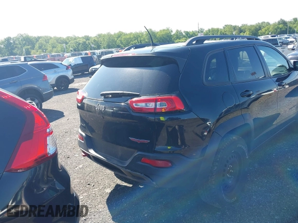 2016 Jeep Cherokee Trailhawk z VIN 1C4PJMBS6GW162742, wystawiony jako IAAI lot #42383200 z przebiegiem 124 791 mil mil oraz . Historia ofert i sprzedaży dostępna na DreamBid. Obrazek 16.