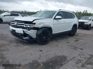 2018 Volkswagen Atlas 3.6L V6 SEL with VIN 1V2MR2CA9JC572206, listed as a IAAI auction lot 41995114 with 64,324 mi miles. Bid and sale history available at carsss.com. Image 2.