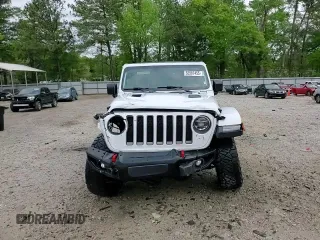 2018 Jeep Wrangler Unlimited Rubicon with VIN 1C4HJXFG2JW244664, listed as a Copart auction lot 52987455 with 40,463 mi miles and Salvage title. Bid and sale history available at DreamBid. Image 15.